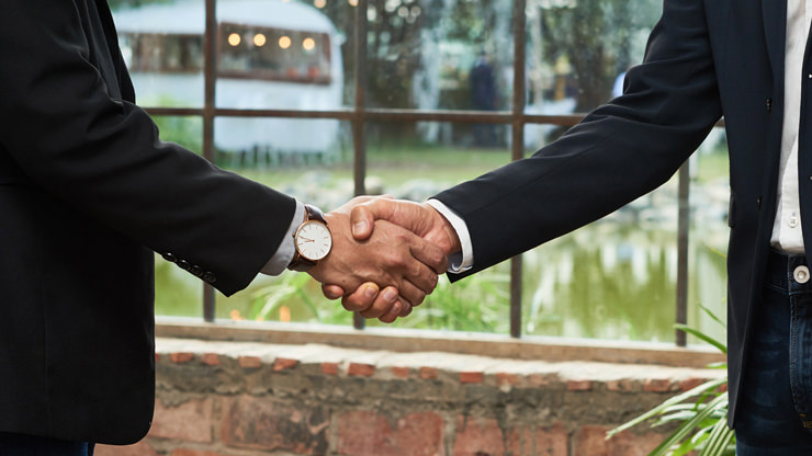 two business man shaking hands